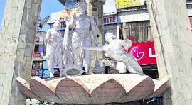 The statue of Raja Karna and Lord Krishna in the heart of the city .