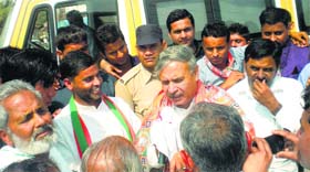BJP candidate from Gurgaon Rao Inderjit Singh interacts with his supporters.