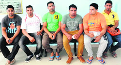 Kabaddi players wait at the Multipurpose Sports Stadium for the results of trials conducted for the selection of team to be sent to Lahore International Sports Festival on Friday. Tribune photo