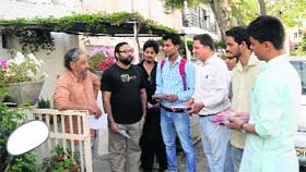 ABVP activists campaign door to door at Sector 15 in Chandigarh on Friday.