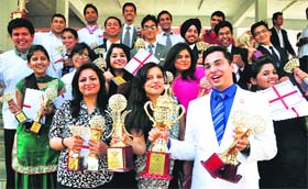 Students of the Chandigarh Institute of Hotel Management in a jubilant mood after receiving prizes at the annual prize distribution function in Sector 42, Chandigarh, on Friday.