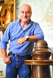 Actor Anupam Kher strikes a pose on his visit to Ludhiana on Friday.