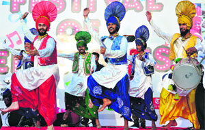 Artistes perform bhangra at a voting awareness programme sponsored by The Tribune at the Plaza in Sector 17, Chandigarh, on Saturday.