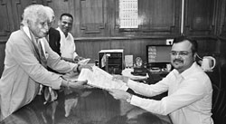 Congress candidate Madhusudan Mistry filing his nomination papers in Vadodara on Saturday. PTI 