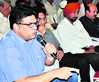Assistant Returning Officer Rajiv Prashar addresses the staff on election duty at Government Polytechnic College in Bathinda on Sunday