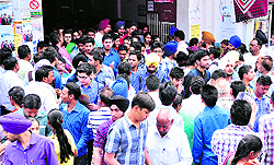 Candidates come out of an examination centre in Bathinda on Sunday