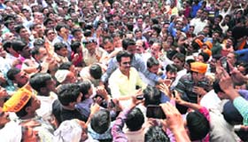 Bollywood star Anil Kapoor surrounded by BJP supporters and fans at an election rally in Sector 26, Chandigarh, on Sunday