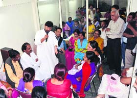 Chowdhary Lal Singh, Congress co-in charge of the party affairs in the state, addresses party workers in Dehradun on Sunday
