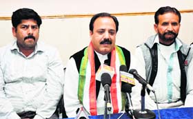 Members of the Jammu and Kashmir Kissan Khet and Mazdoor Congress address a press conference in Jammu on Sunday