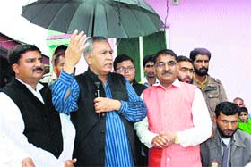 BJP leader and retired IGP Farooq Khan addresses a poll rally in Poonch on Sunday