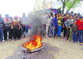 People protest unavailability of ration at government depots in Poonch on Sunday