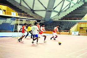 Players in action during a football match in Srinagar on Sunday