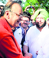 Arun Jaitley (left) and Capt Amarinder Singh shake hands in Amritsar on Sunday