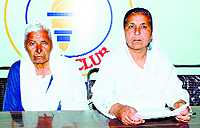 Bakhshish Kaur (left) and her daughter Kuldeep Kaur at a press meet in Hoshiarpur