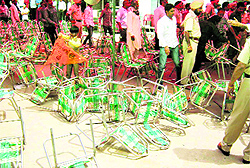 Chairs lie scattered after the clash in Malerkotla on Sunday