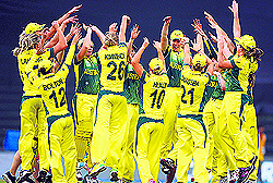 The Australian women celebrate their victory over England in the ICC Womens World T20 final