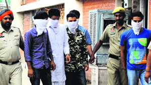 The accused in police custody in Mohali on Monday.