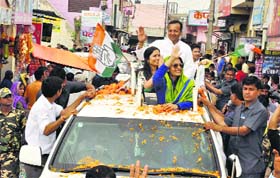 Actress Raveena Tandon and Congress candidate Naveen Jindal canvassduring a roadshow in Yamunanagar on Monday.