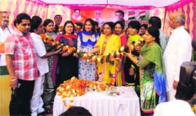 Avantika Maken Tanwar (centre) and Ragini Nayak campaign for Congress candidate