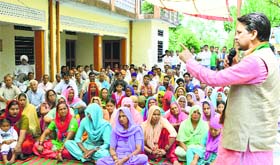 BJP candidate from Hamirpur Anurag Thakur addresses a public meeting in Haroli on Monday