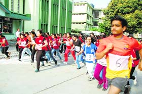 Students and faculty members of DRPGMC Tanda during a run for fun on the college campus on Monday