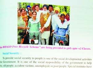 CM Parkash Singh Badals picture in a PSEB class VIII book.