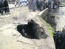 A portion of the bridge which collapsed on the Lolab-Kupwara road. 