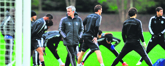 Chelseas manager Jose Mourinho looks on during a training session at Cobham, southwest of London, on Monday, ahead of their forthcoming Champions League quarterfinal second leg match against Paris Saint-Germain. AFP