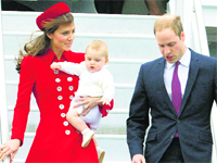 Britains Prince William and Catherine, Duchess of Cambridge with Prince George in Wellington on Monday. AP/PTI