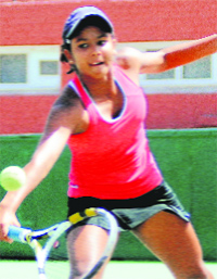 Aesha in action during a match at the CLTA, Sector 10, Chandigarh. Tribune photo: S Chandan