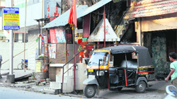 A temple constructed on footpath on EC Road in Dehradun. A Tribune photograph