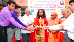 Swami Chidanand along with other doctors during the inauguration of the spinal and physiotherapy centre in Rishikesh on Tuesday. A Tribune photograph