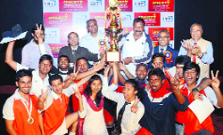 The winners of the sports meet celebrate with the trophy at the DIT in Dehradun on Tuesday. A Tribune photograph 