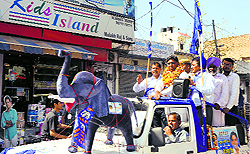 BSP candidate Dr Kapoor Singh during a roadshow in Ambala cantonment on Tuesday