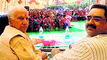 Shanta Kumar addresses an election meeting at Dehan in Palampur on Tuesday