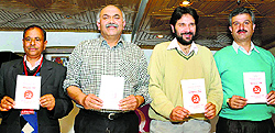 State CPM leaders release the manifesto for the Lok Sabha elections in Shimla on Tuesday