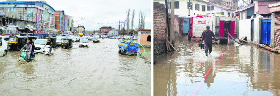 Vehicles pass through a waterlogged road near Exhibition Crossing; and (right) a fire engine drains rainwater from a road in Srinagar on Tuesday. Tribune photos: Amin War, Yawar Kabli