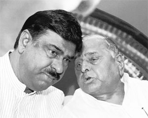 BJP leader and former Union minister Ashok Pradhan with SP supermo Mulayam Singh Yadav in Lucknow on Tuesday.