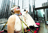 A trailer carries Seward Johnson's sculpture Forever Marilyn featuring Marilyn Monroe in Pittsburgh, US