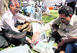 Election officials check electronic voting machines at Sector 14 in Panchkula on Wednesday