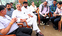 Congress candidate Pawan Kumar Bansal interacts with supporters at his residence in Sector 28, Chandigarh, on Wednesday