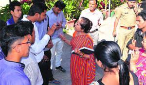 Officials from the Education Department during a crackdown on Jaswant Modern School in Dehradun on Wednesday.