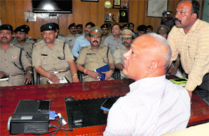DIG Amit Sinha addresses a workshop on IT Act at his office in Dehradun on Wednesday.