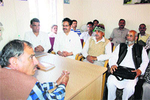 AAP activists hold a meeting in Mandi on Wednesday. 