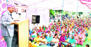 Chief Minister Virbhadra Singh addresses an election rally at Ambota in Una on Wednesday