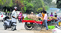 Rehri owners encroach upon the road on the Akhnoor highway in Jammu