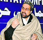 Moderate Hurriyat Conference chairman Mirwaiz Umar Farooq talks to mediapersons at the Hurriyat headquarter at Rajbagh in Srinagar on Wednesday