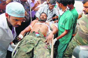 An injured CRPF jawan being shifted to a Raipur hospital after a Naxal attack in Sukma on Wednesday