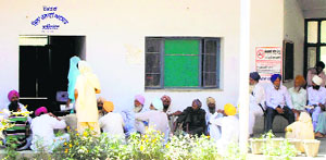 Shagun Scheme cheques being distributed in Faridkot on Wednesday.