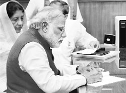 BJP prime ministerial candidate Narendra Modi files his nomination papers at Vadodara on Wednesday.